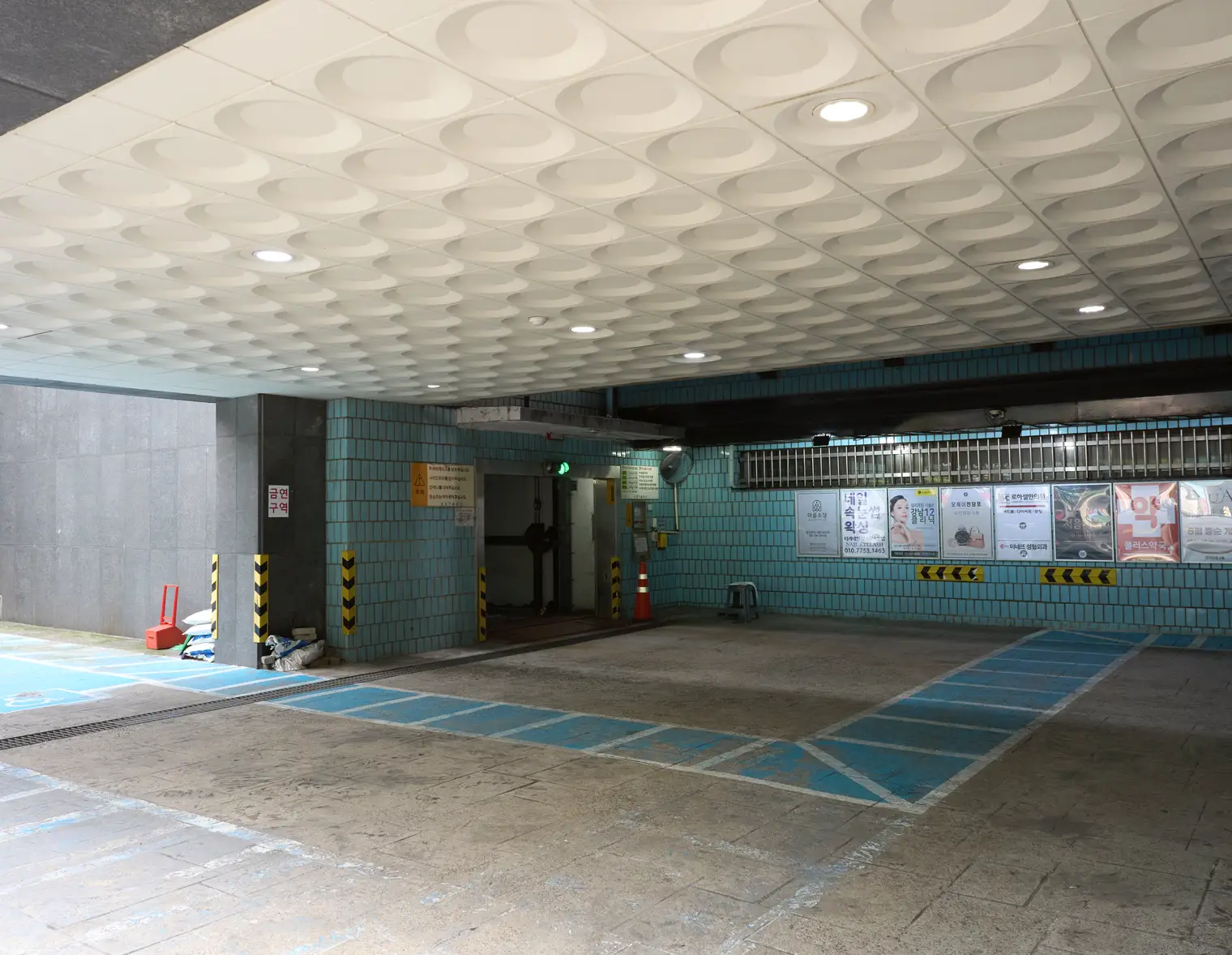 Inside the Daegun Building underground parking lot